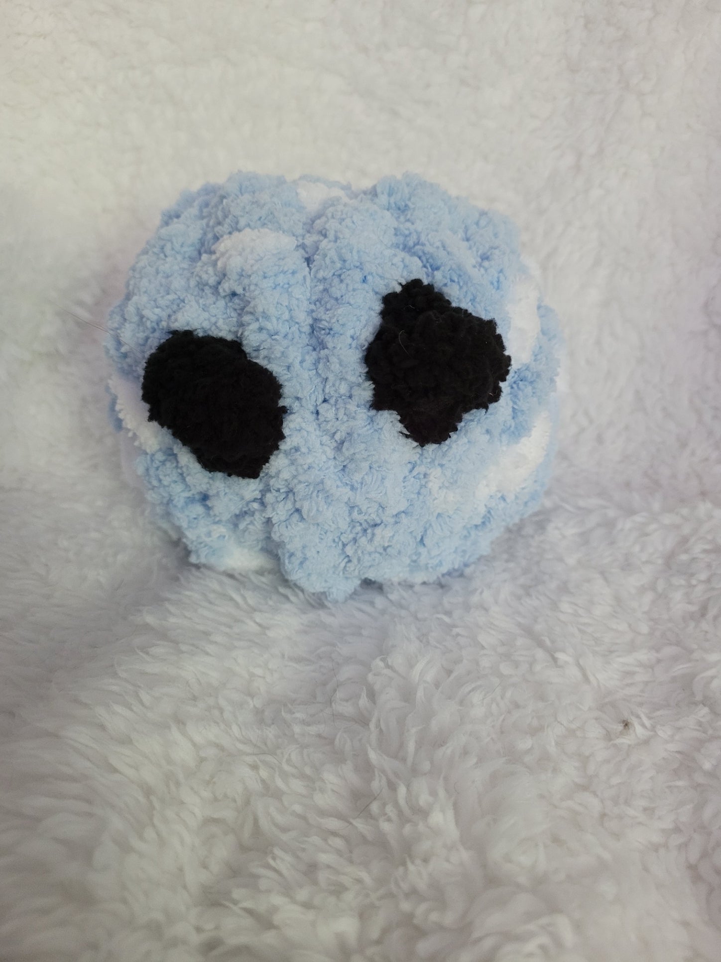 Handmade blue and white Desk Buddy plush with soft black yarn eyes