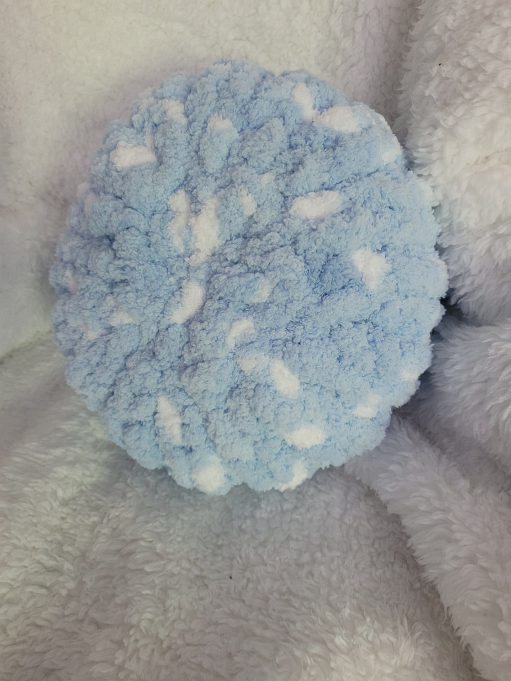 Handmade white round chunky chenille pillow with blue accents