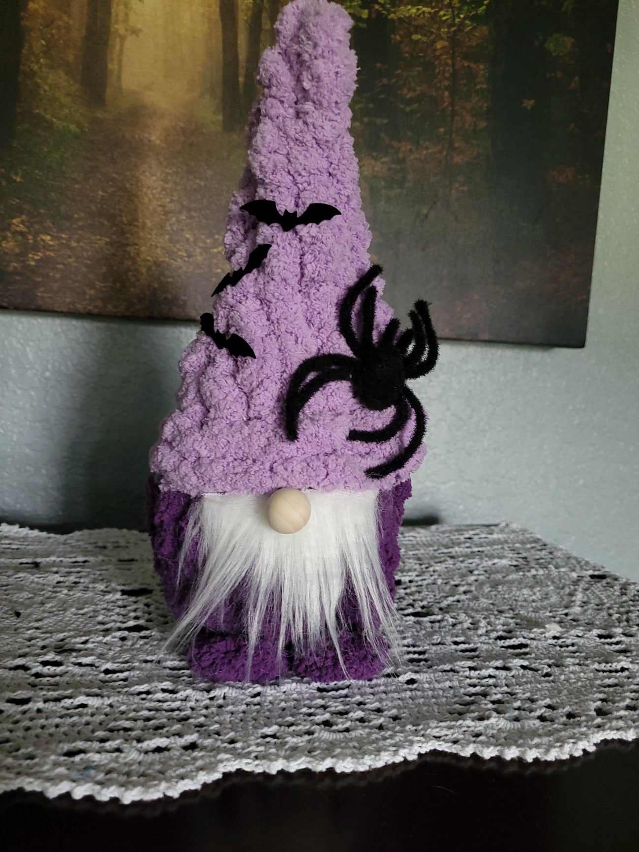 Hand knit purple Halloween gnome with tall chenille hat, bat and spider decorations, white beard and wooden bead nose — Magnus by CozyByBeverly
