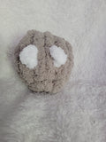 Handmade taupe Desk Buddy plush with soft white yarn eyes
