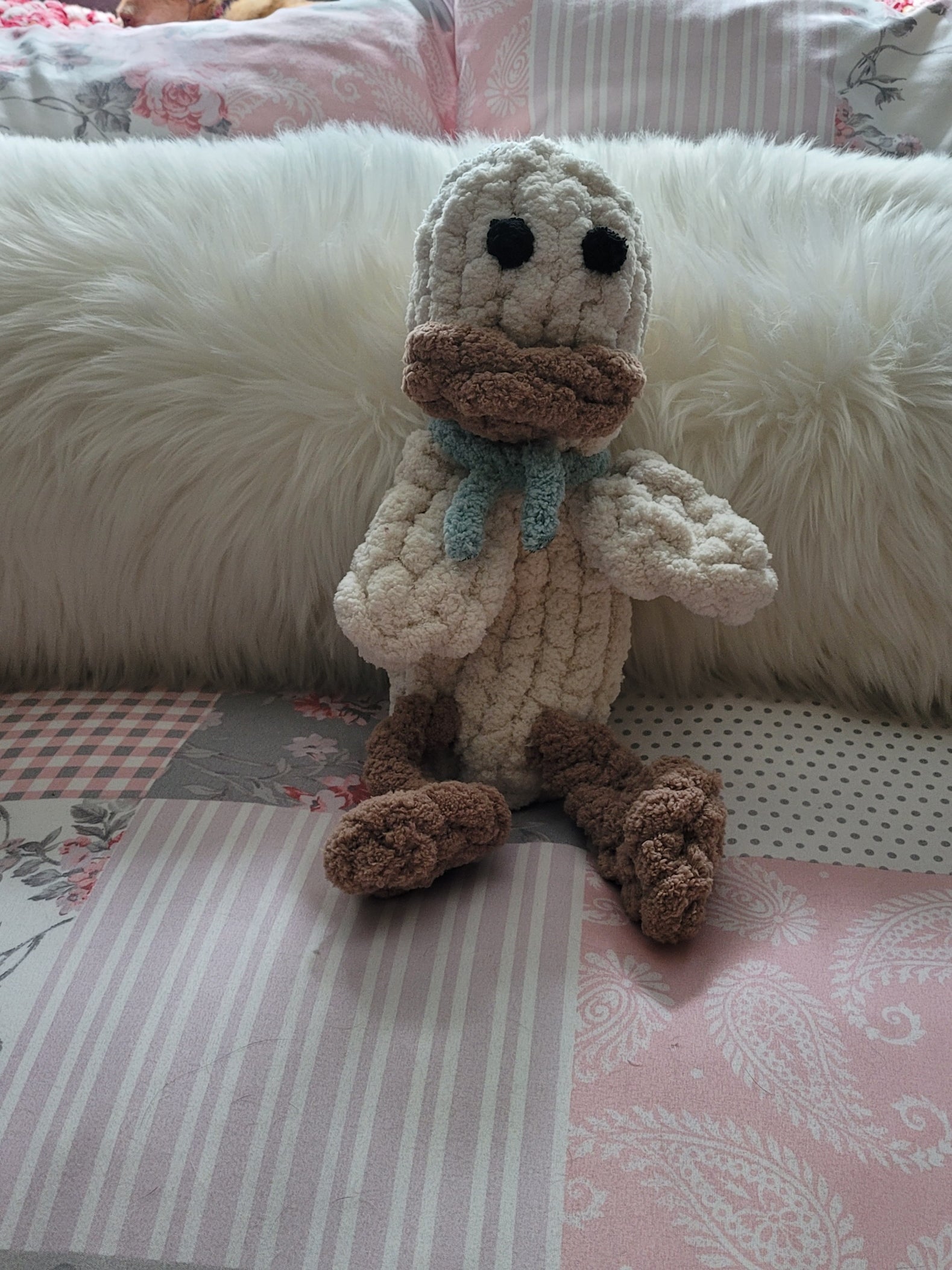 “Chunky chenille duck plush with wide brown beak and soft squishy body”